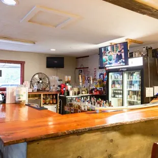 Our locally sourced natural edge bar is a homey spot to hang out with friends.