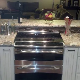 Pull out spice racks on both sides of range.