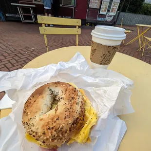 Ham, egg, and cheese everything bagel with a latte