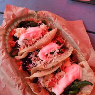 Buttermilk tacos with cilantro lime rice, black beans, chicken, pablanos, cheese, and sour cream