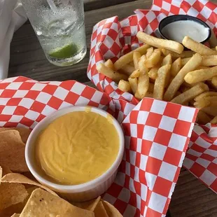 Side of queso &amp; chips and fries with house ranch.