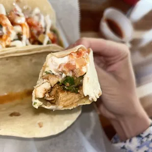 2 Grilled chicken tacos (added sour cream, onion, and salsa)