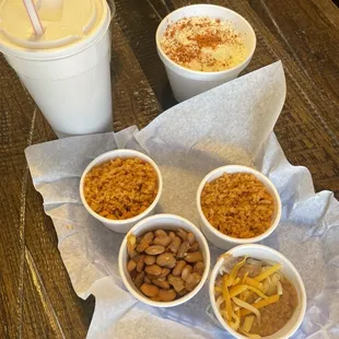 four bowls of food on a table