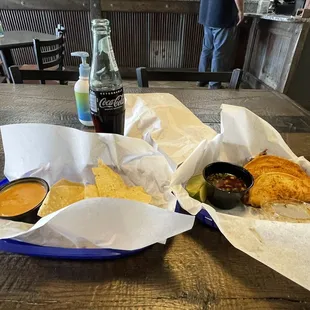 Barria Tacos, Mexican coke, small spicy chips and queso.