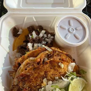 Pork Birria tacos and an asada street taco