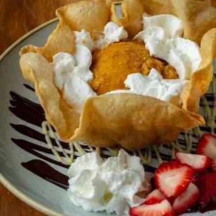 Deep Fried Ice Cream

Horchata Ice Cream I Crispy Won Ton
Chocolate Sauce I Vanilla Sauce