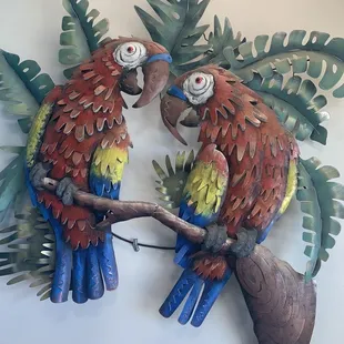 two parrots on a branch