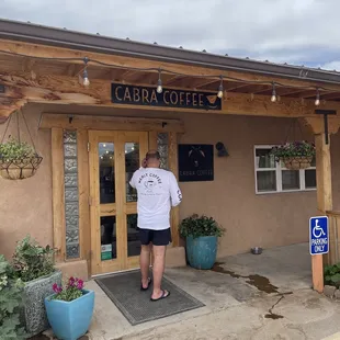 Entry to Cabra Coffee. They also have a drive thru.