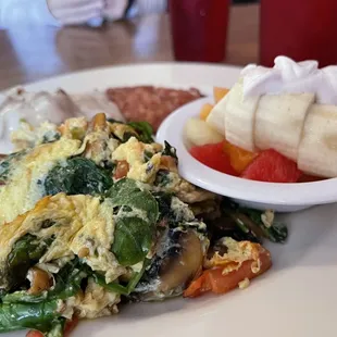 The Country: Corned Beef Hash, eggs scrambled w/ spinach, mushrooms, &amp; tomatoes. Biscuits &amp; Gravy and fruit. 5 out of 5!