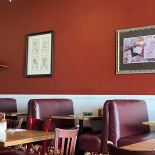 Seating in booths and tables inside