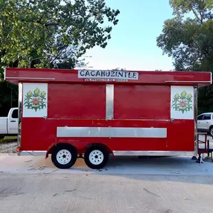 a red and white food truck