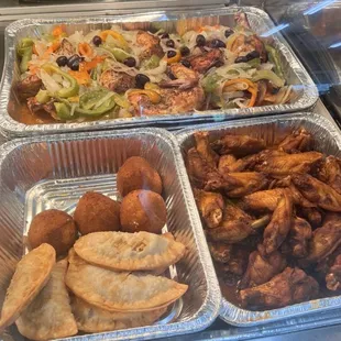 Baked chicken, beef, empanadas, stuffed potatoes, and chicken wings. All are amazing.