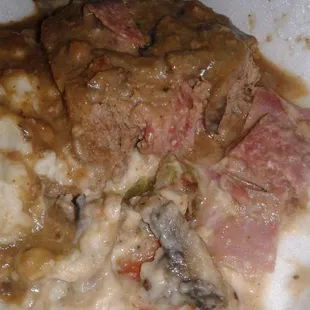 Meatloaf with pieces of deli meat inside.