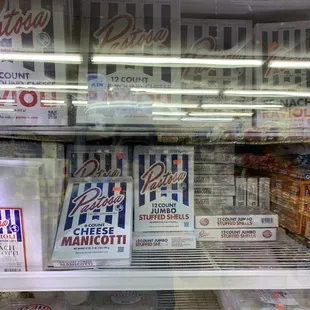 a display of cheeses and milk