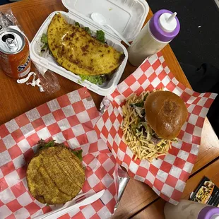 Steak Cachapa to the left, Venezuelan Burger aka Maracucha to the right, and a beef Patacon in the center!