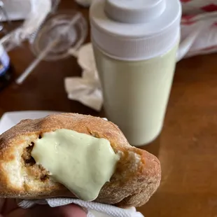 a person holding a pastry
