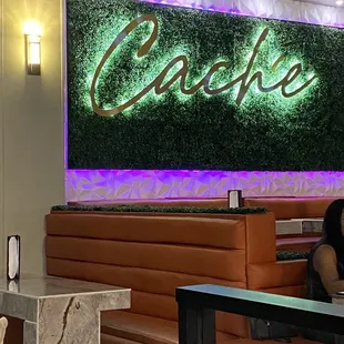 a woman sitting at a table