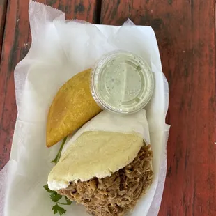 Carne Mechada Arepa and Empanada