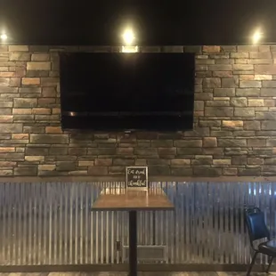 a tv mounted on the wall