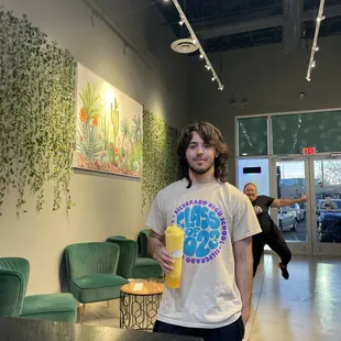 Handsome guy with mango smoothie，The latter is more difficult to describe.