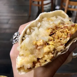 Breakfast burrito with chorizo, beans and green chili