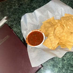 Drink menu and their chips and salsa. I always say upon first visit it&apos;s always safe to judge how the food will be based on their salsa!
