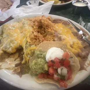 Green enchiladas. Beans tasted like they came from a can, rice and meat extremely flavorless.