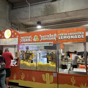 people standing in line at the counter