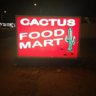 a neon sign in the dark