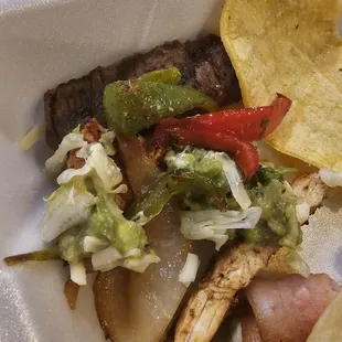 Chicken , steak, onions and peppers
