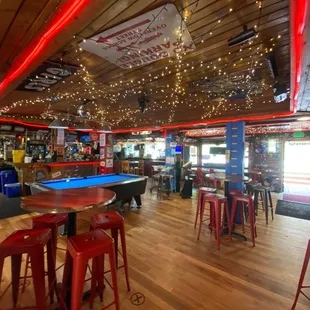 This view is from the bathrooms looking toward the bar and front doors.
