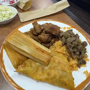 Quesabirria, steak fajitas, carne de puerco, and tamales.