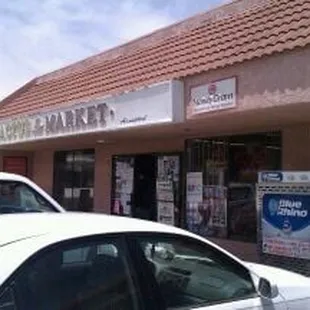 cars parked in front of the store