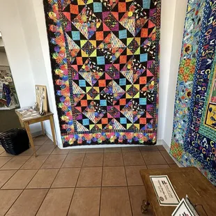 shop entry with a very fun, colorful quilt