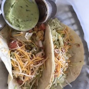 Fish tacos, with a side of guacamole