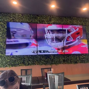 Large TVs in dining area