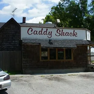 a car parked in front of it