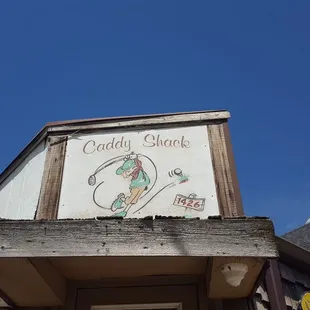 a sign on the side of a building