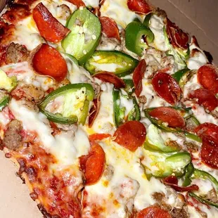 a pizza in a pizza box