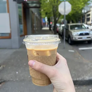 Iced vanilla latte with oat milk