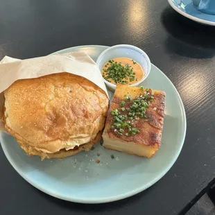 Sausage egg and cheese sandwich and potato pave