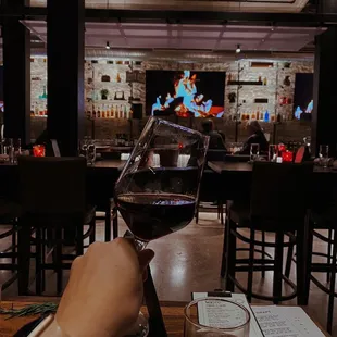 The view of the bar area (featuring my glass of Sangiovese)