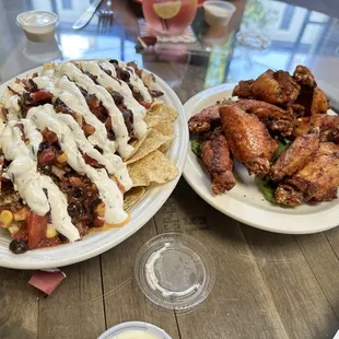 Pulled pork nachos and yummy wings