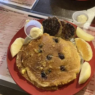 Blueberry lemon pancakes with sausage.