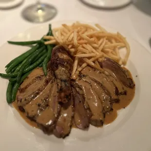 Roast Duck With Peppercorn Sauce, Fries and Green Beans