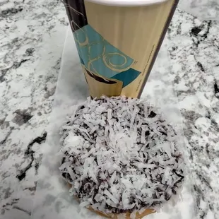 a cup of coffee and a doughnut