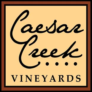 the logo for caesar creek vineyards