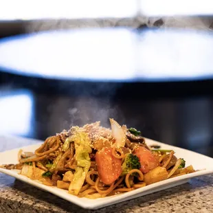 ows a plate of noodles