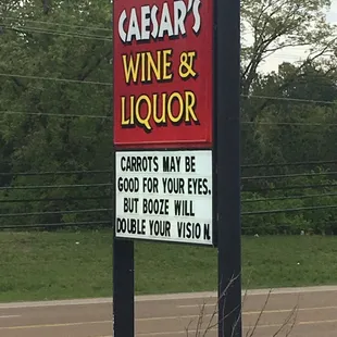 a sign on the side of the road