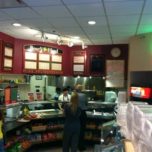 customers at the counter of a restaurant